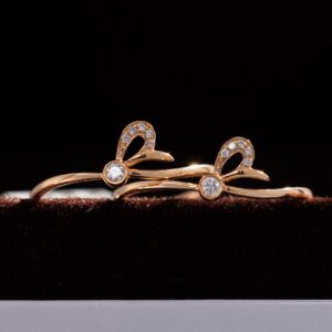 Women's Ring With Bow Shape Design Crafted In 18k Rose Gold With Natural Diamonds (1)