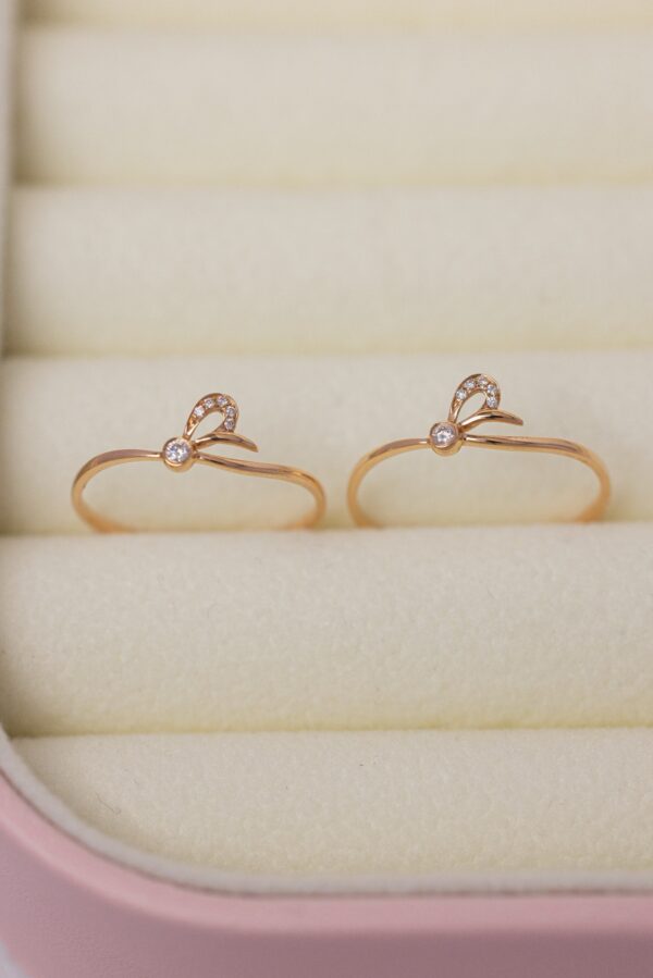 Women's Ring With Bow Shape Design Crafted In 18k Rose Gold With Natural Diamonds (1)